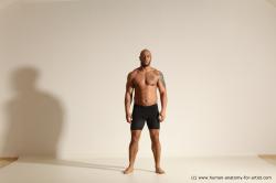 Underwear Gymnastic poses Man Black Muscular Bald Dancing Dynamic poses Academic